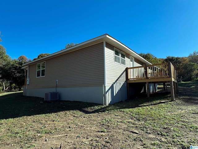 view of home's exterior featuring a deck