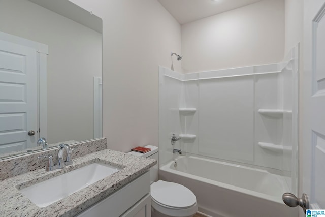 full bathroom with shower / bathing tub combination, vanity, and toilet