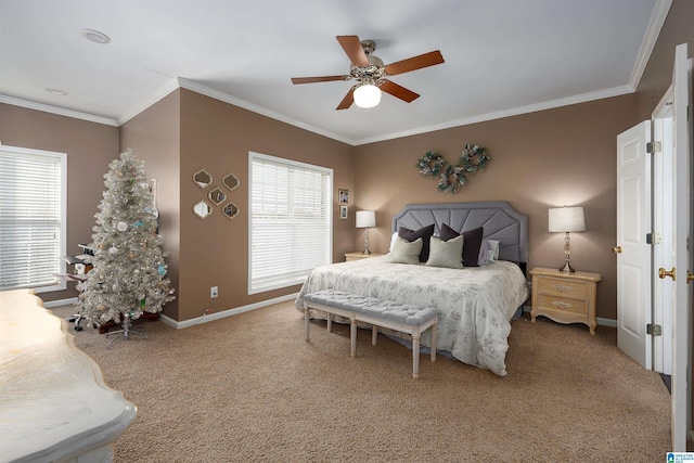 carpeted bedroom with ceiling fan and crown molding