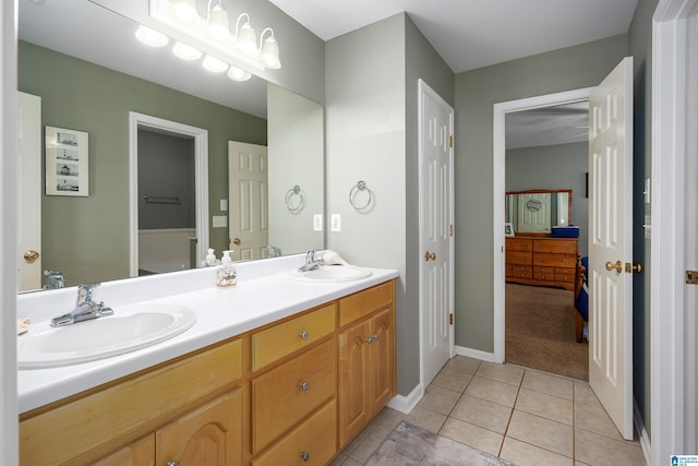 bathroom with vanity and tile patterned floors