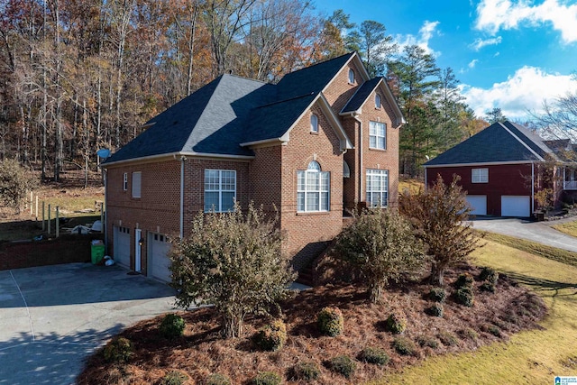 front of property with a garage