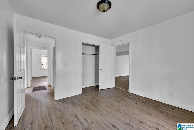 unfurnished bedroom with light hardwood / wood-style floors