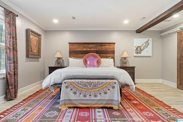 bedroom with beam ceiling, light wood-type flooring, and ornamental molding