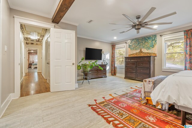 bedroom with light hardwood / wood-style floors, multiple windows, crown molding, and ceiling fan