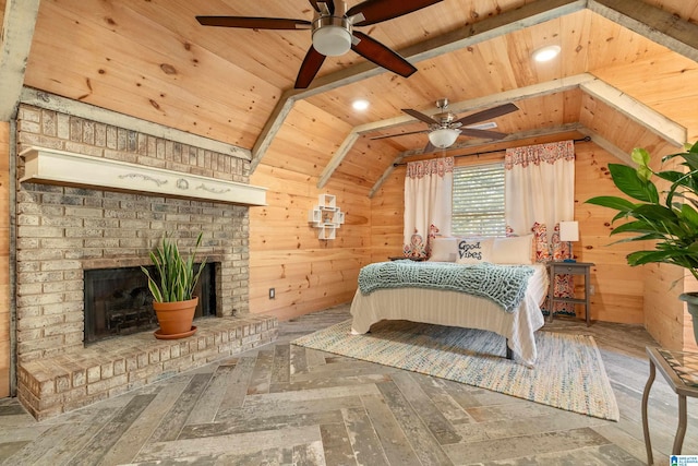 bedroom featuring ceiling fan, wooden walls, wooden ceiling, a fireplace, and vaulted ceiling with beams