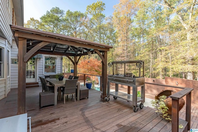 wooden terrace with a gazebo