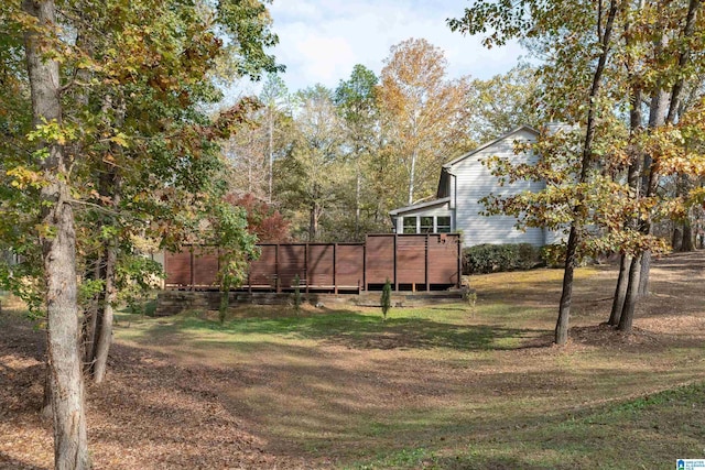 view of yard featuring a wooden deck