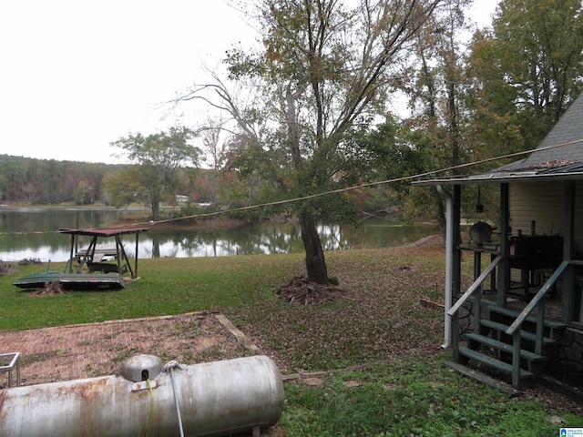 view of yard with a water view