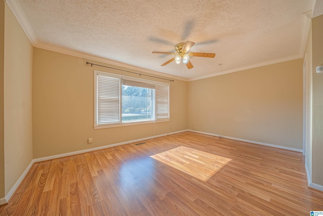 empty room with a textured ceiling, light hardwood / wood-style floors, ceiling fan, and crown molding