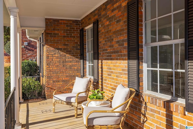 balcony featuring covered porch