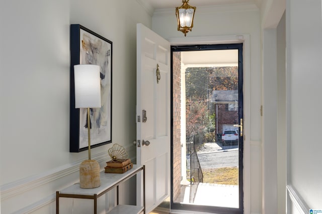 entrance foyer with crown molding