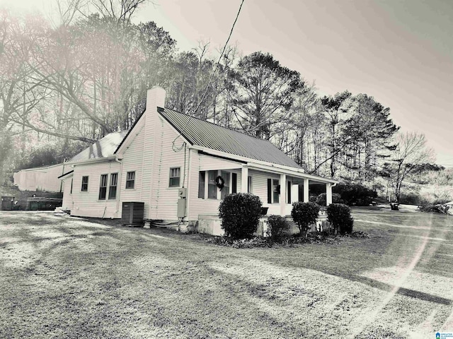 view of side of property featuring cooling unit