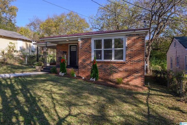 view of front facade with covered porch and a front yard