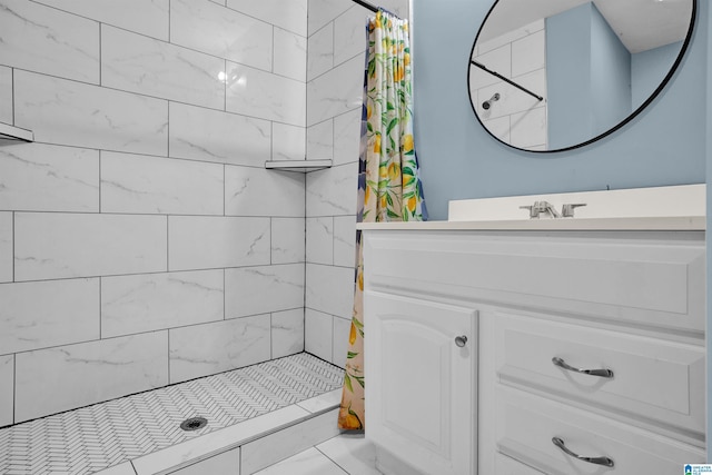 bathroom featuring a shower with curtain and vanity