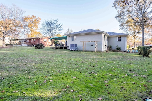 view of yard with central AC unit