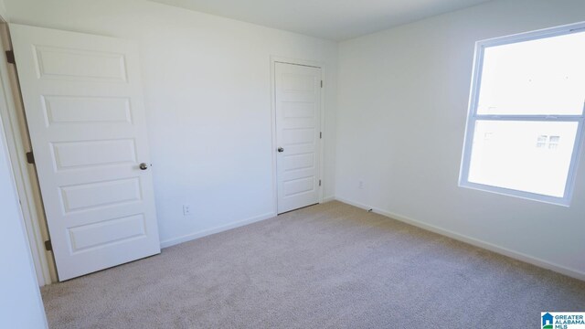 view of carpeted spare room