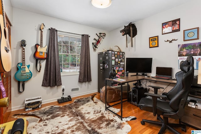 home office featuring wood-type flooring