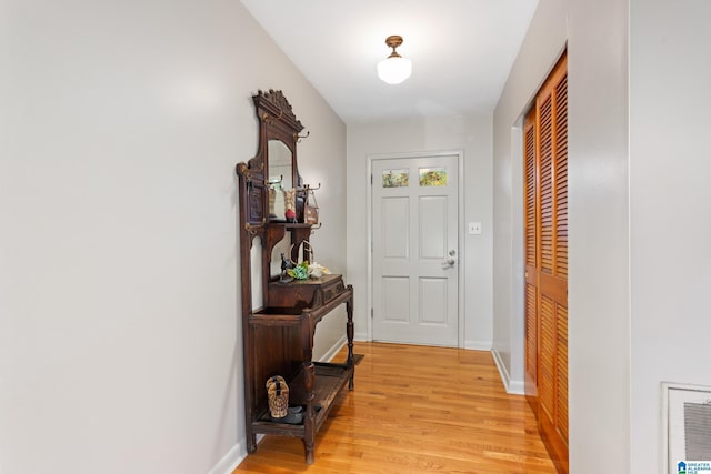 doorway to outside with light hardwood / wood-style floors