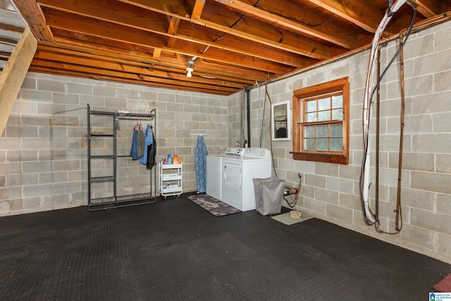 basement with washer and clothes dryer