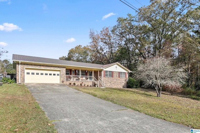 ranch-style house featuring a front lawn, a porch, and a garage