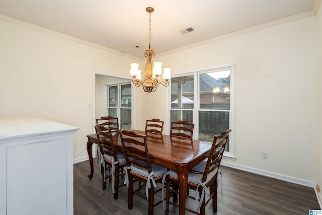 dining space featuring a notable chandelier, crown molding, and dark wood-type flooring