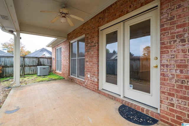 view of patio featuring ceiling fan, french doors, and central AC unit