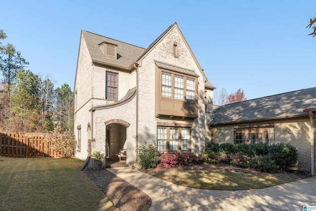 view of front of home with a front lawn