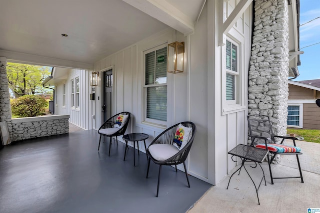 view of patio featuring a porch