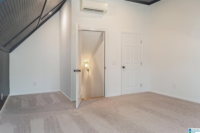 additional living space featuring carpet floors and an AC wall unit