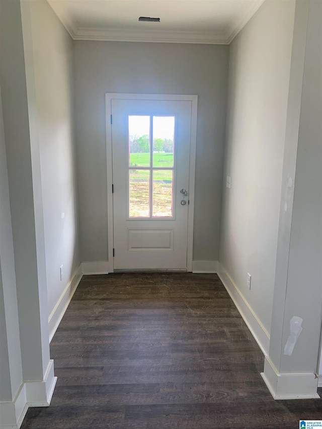 doorway featuring dark hardwood / wood-style floors and ornamental molding