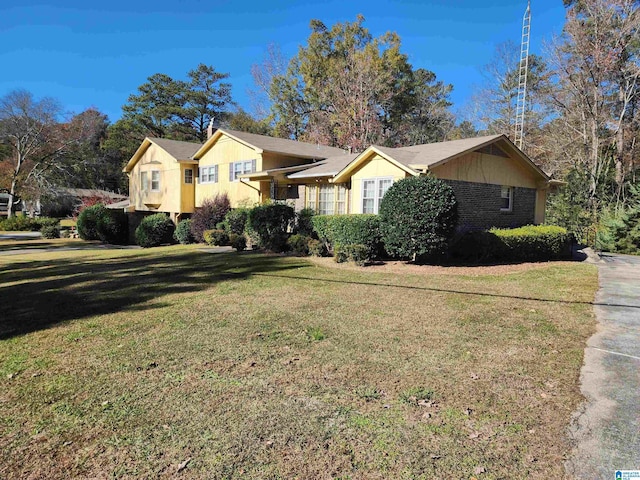 view of front of home with a front yard