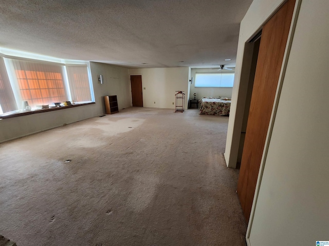 interior space featuring a textured ceiling