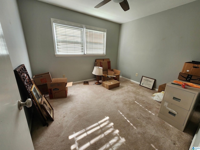 unfurnished room with light carpet and ceiling fan