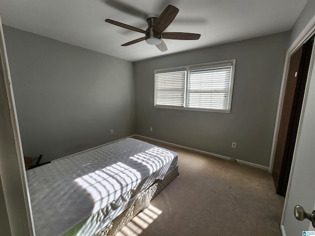 bedroom with carpet flooring and ceiling fan