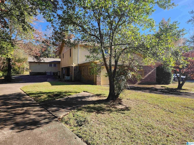 exterior space with a front lawn