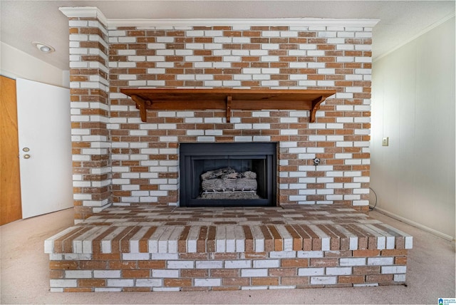 interior details featuring crown molding, a fireplace, carpet floors, and a textured ceiling