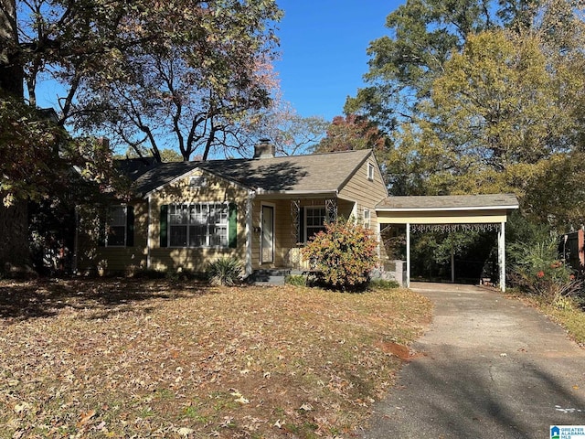 view of front of home featuring a carport