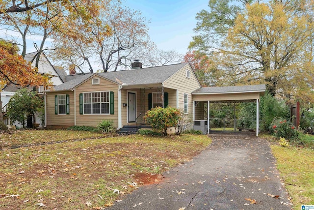 view of front of house featuring a carport