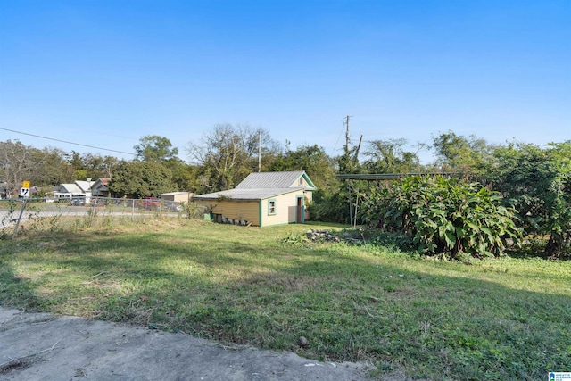 view of yard with a storage unit