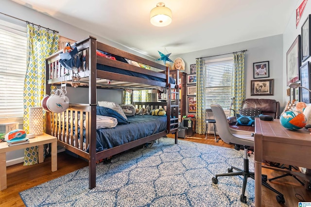 bedroom featuring hardwood / wood-style flooring