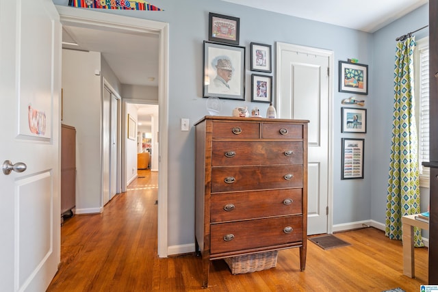 corridor featuring light hardwood / wood-style flooring