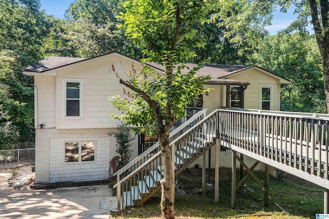 view of front property with a wooden deck