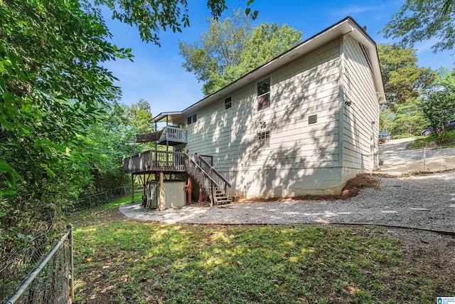 view of home's exterior featuring a deck