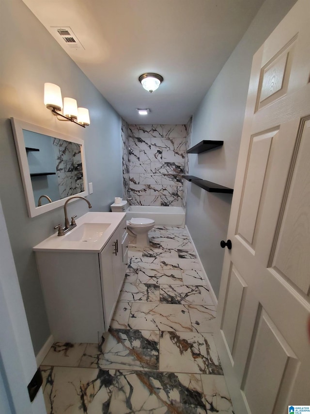 1245 16th St SW, Birmingham, AL 35211 - bathroom with vanity, toilet, marble finish floors, baseboards, and bathing tub / shower combination