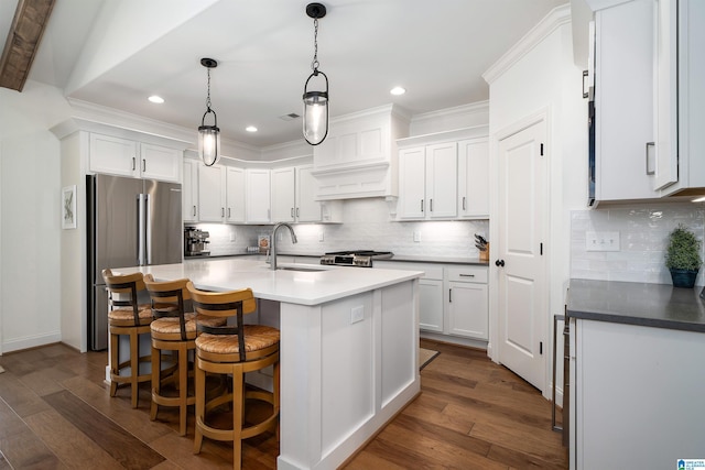 kitchen featuring white cabinets, decorative backsplash, and dark hardwood / wood-style flooring