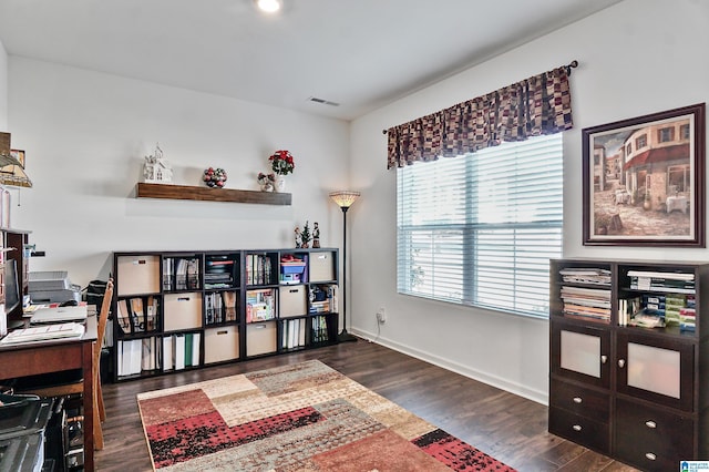 office with dark hardwood / wood-style flooring