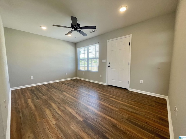 1304 3rd St SE, Cullman, AL 35055 - spare room with ceiling fan and dark hardwood / wood-style floors