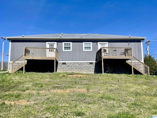 1314 3rd St, Cullman, AL 35055 - rear view of property with a lawn and a wooden deck