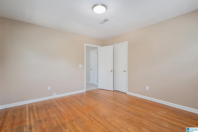 unfurnished bedroom with light hardwood / wood-style floors