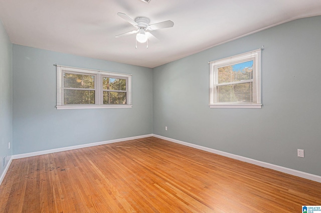 unfurnished room featuring ceiling fan and light wood-type flooring